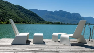 land lounge chair and land ottoman at lake caldaro