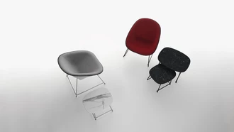 cup lounge chair with fabric upholstery and seat shell in ABS and lounge table 