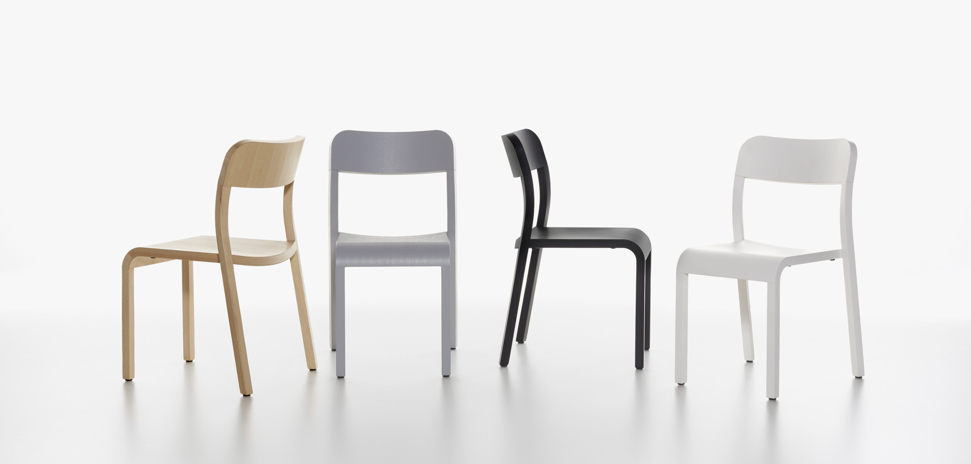 Plank - BLOCCO chair in the colors ash natural, grey, black and white.
