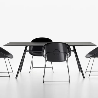 Cup armchair made of black ABS with fabric upholstery and Mart rectangular table in black